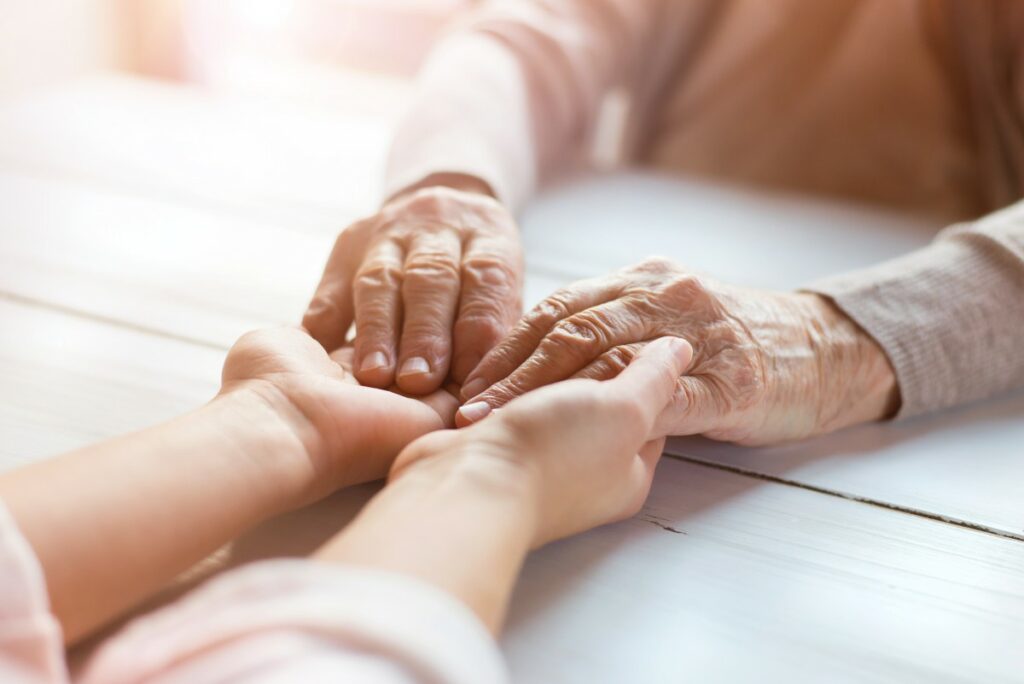 graphicstock-unrecognizable-grandmother-and-her-granddaughter-holding-hands_HC-xjD6W-